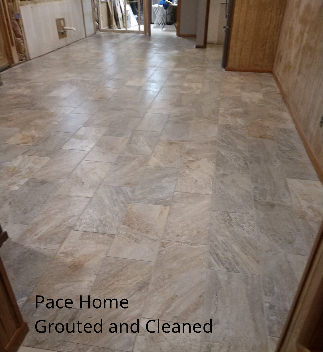 Cleaned and grouted tile floor after flooring project in Pace Florida home